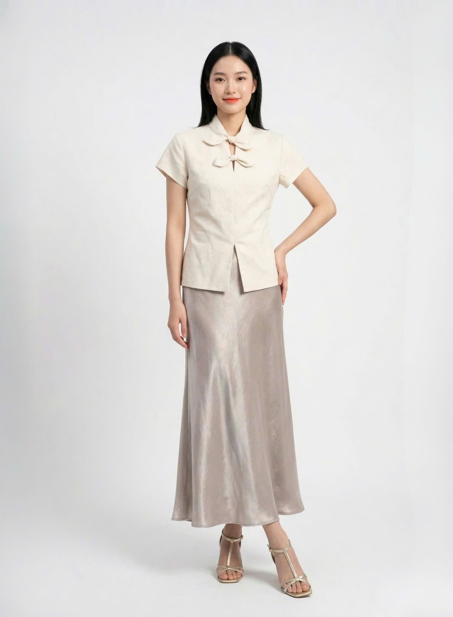 Áo linen chiết eo phối nơ cổ