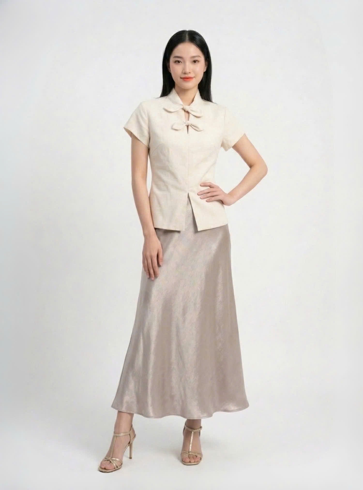 Áo linen chiết eo phối nơ cổ