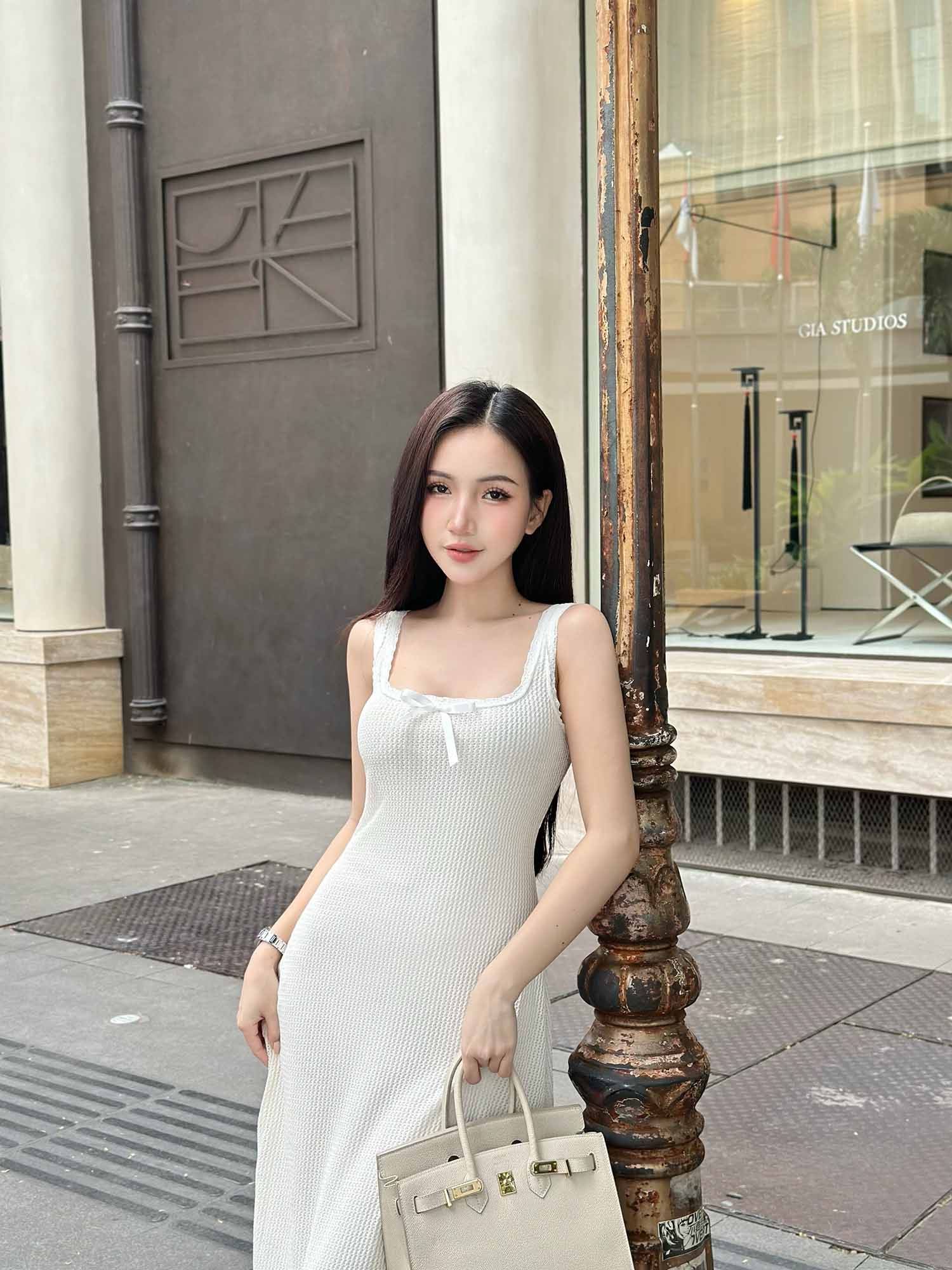 Đầm midi thun dệt kim sát nách cổ U