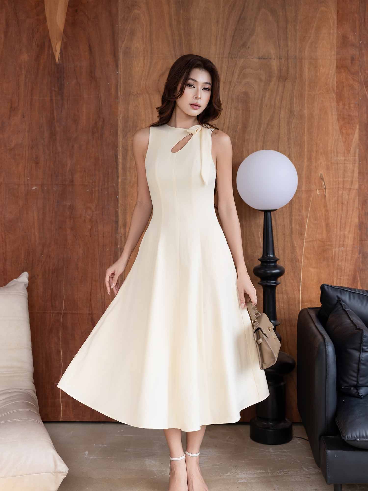 Đầm midi sát nách khoét cổ phối nơ - Marc