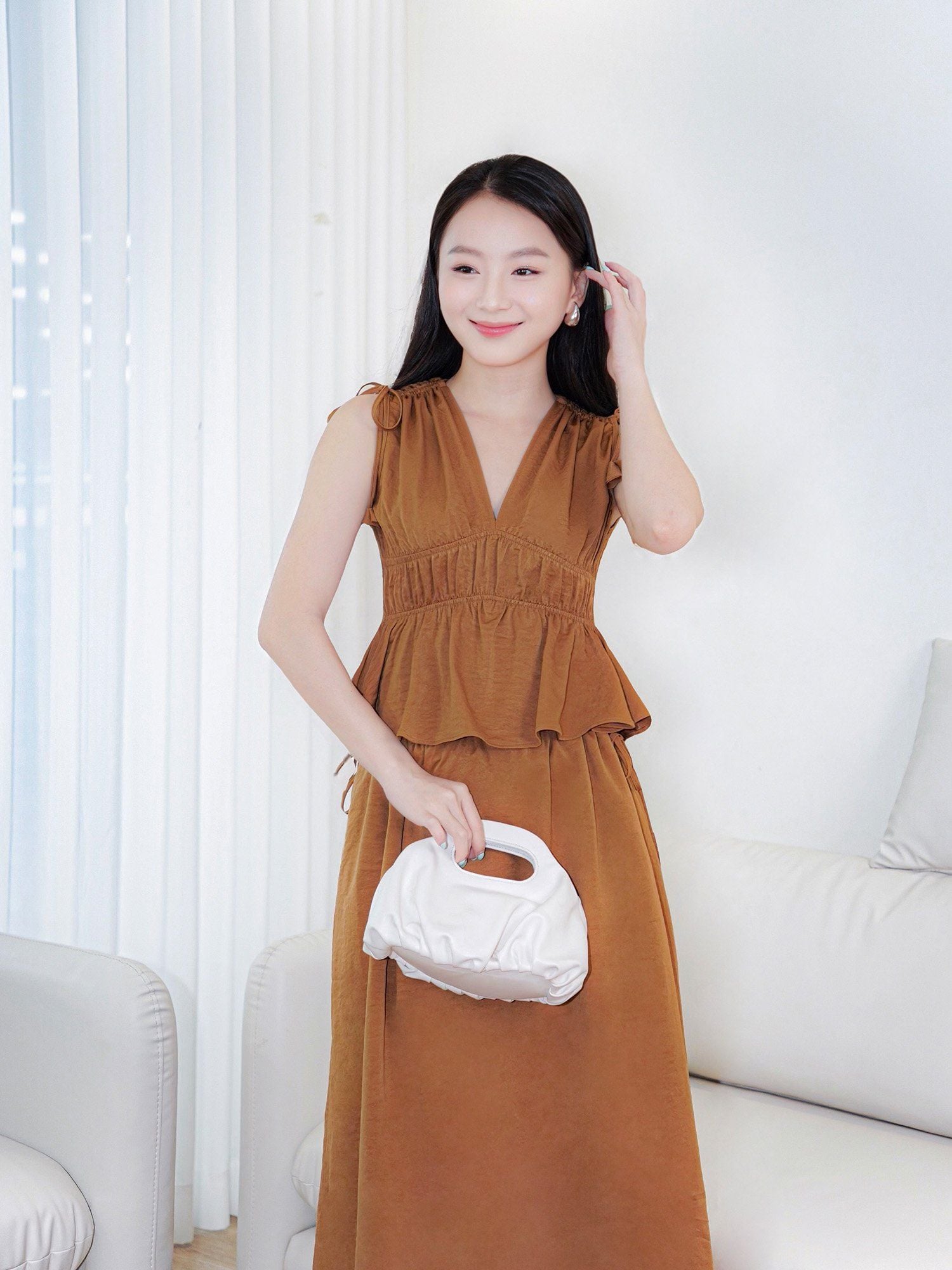  Chân váy dài lưng thun đính nơ hông 