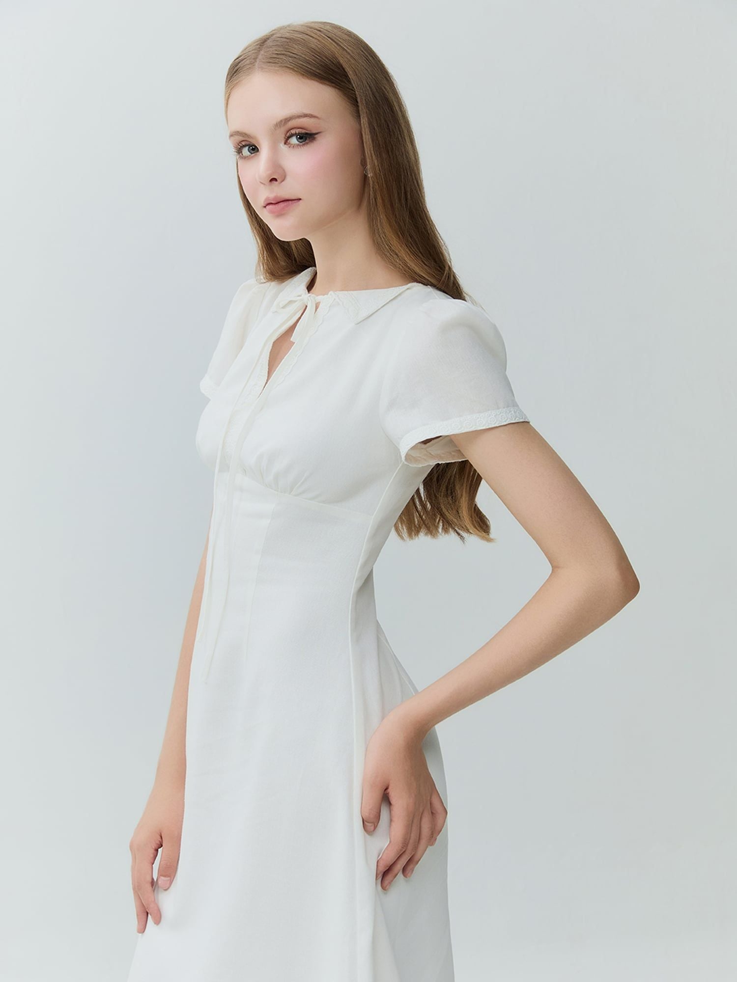  Đầm midi linen thắt nơ 