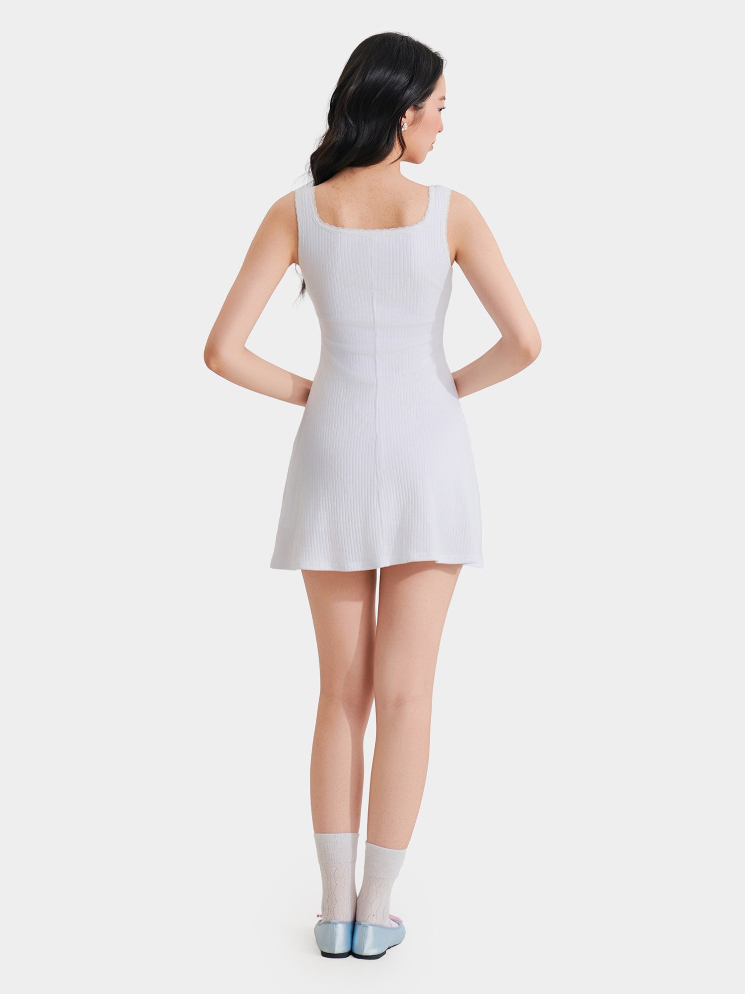 Đầm thun mini form A sát nách cài nút