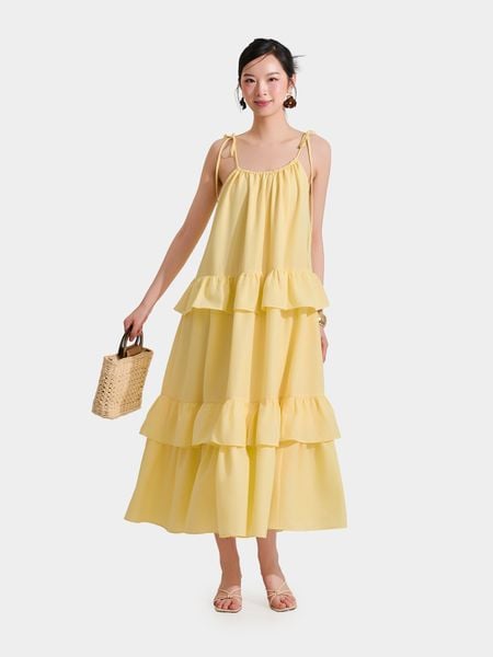  Đầm maxi cổ yếm thắt nơ ba tầng 