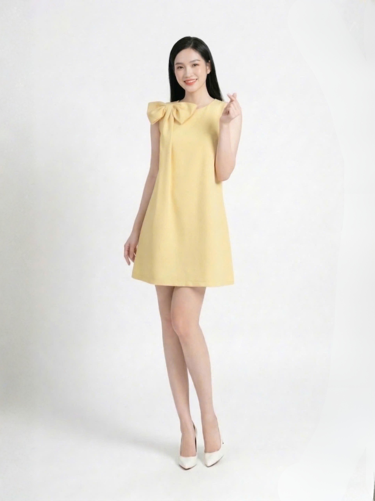  Đầm mini phom suông phối nơ vai cách điệu 