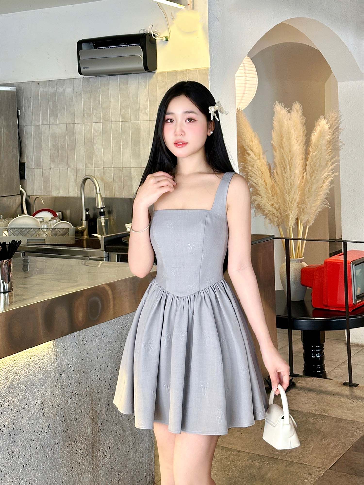  Đầm ngắn basic họa tiết nơ 