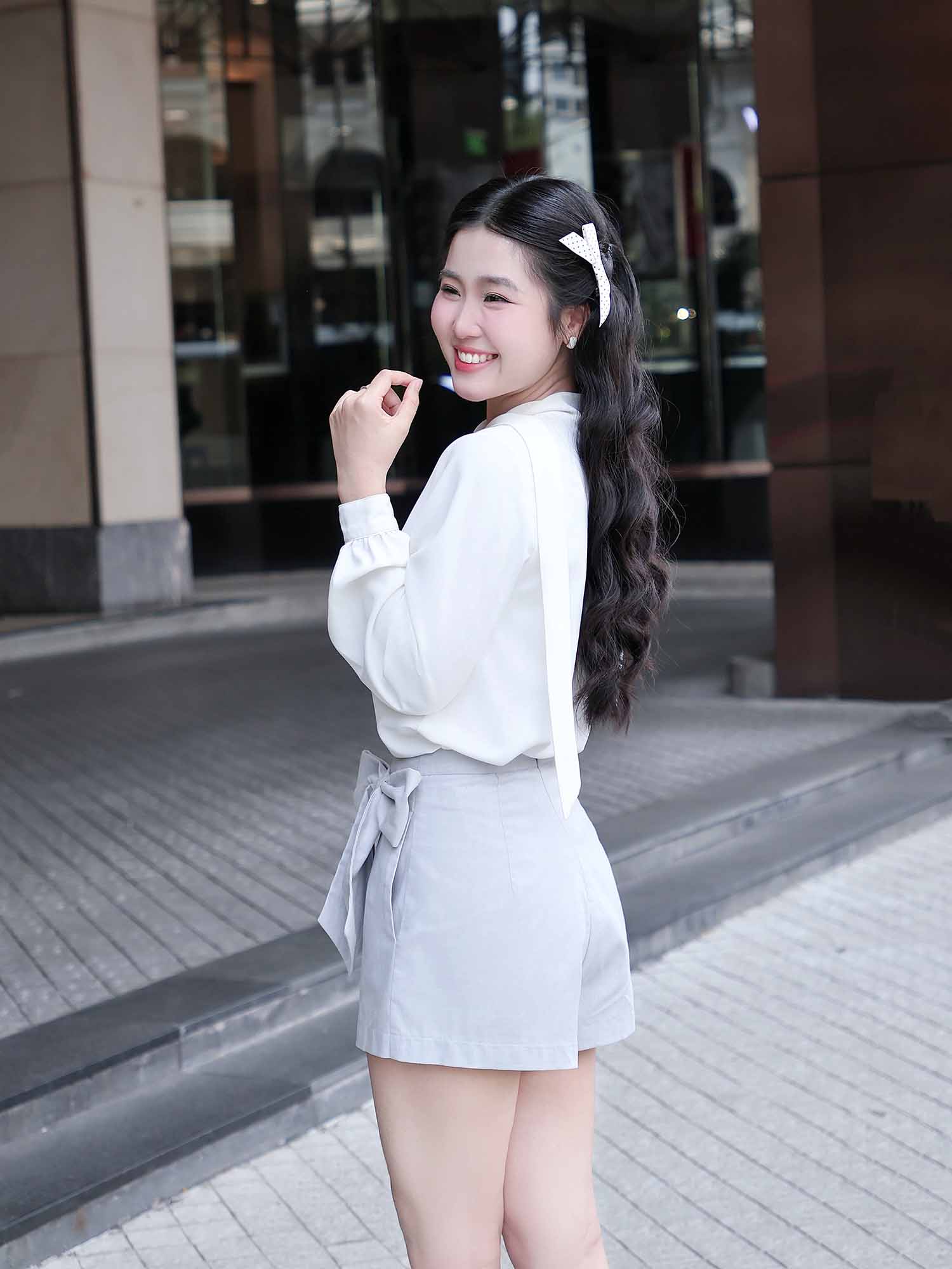 Chân váy skort mini đắp chéo phối nơ