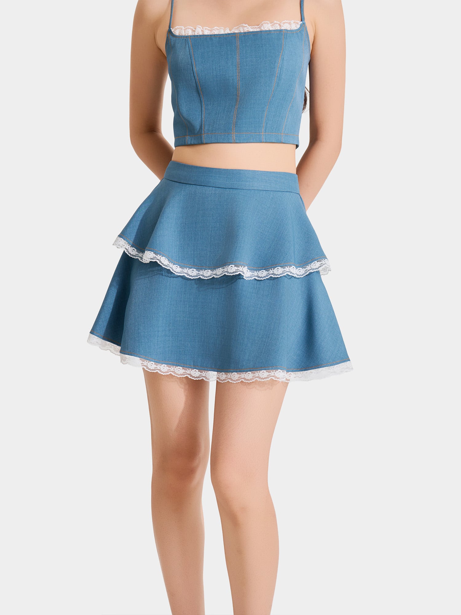 Chân váy hai tầng viền ren phối chỉ nổi