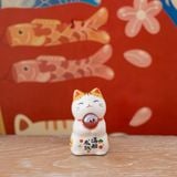  Mèo nhí dâng châu may mắn 