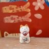  Mèo nhí dâng châu may mắn 