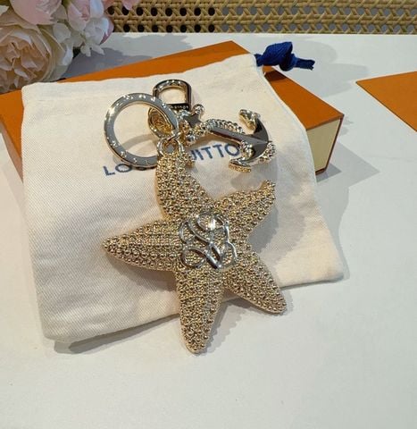 MÓC KHÓA / CHARM TÚI L V STARFISH HÌNH SAO BIỂN PHỐI MỎ NEO KIM LOẠI
