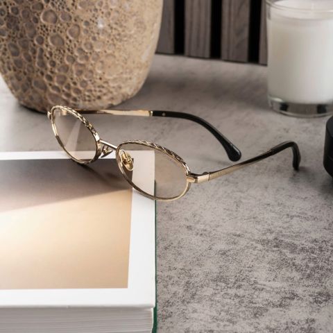 KÍNH MẮT NỮ CN GỌNG KIM LOẠI OVAL CHẠM VÂN NỔI SANG TRỌNG