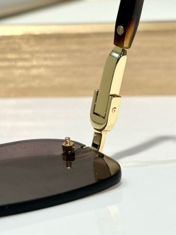 KÍNH RÂM NAM NỮ G C RIMLESS LENS NÂU TRÀ – GỌNG KIM LOẠI PHỐI CÀNG VÂN ĐỒI MỒI