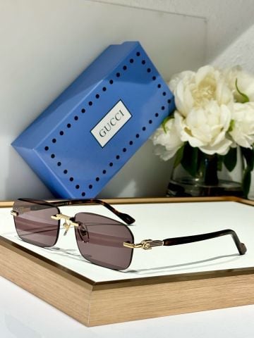 KÍNH RÂM NAM NỮ G C RIMLESS LENS NÂU TRÀ – GỌNG KIM LOẠI PHỐI CÀNG VÂN ĐỒI MỒI