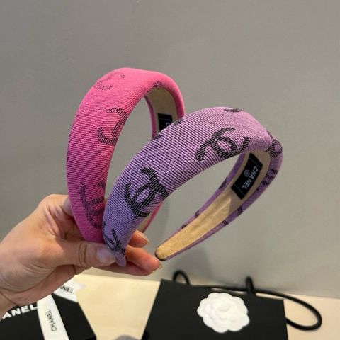 BỜM TÓC NỮ CHNL VẢI DỆT LOGO NỔI – FORM DÀY TÔN KHUÔN MẶT