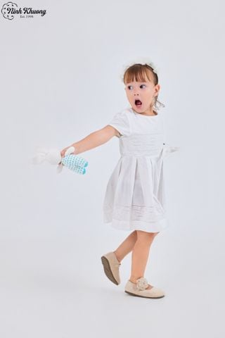  Dress with rose print, ruffled hem, and a bow at the waist 