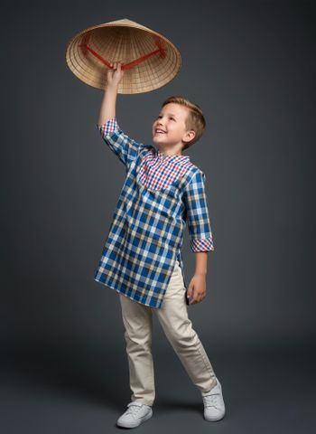  Modernized Áo Dài in color-blocking for boys 