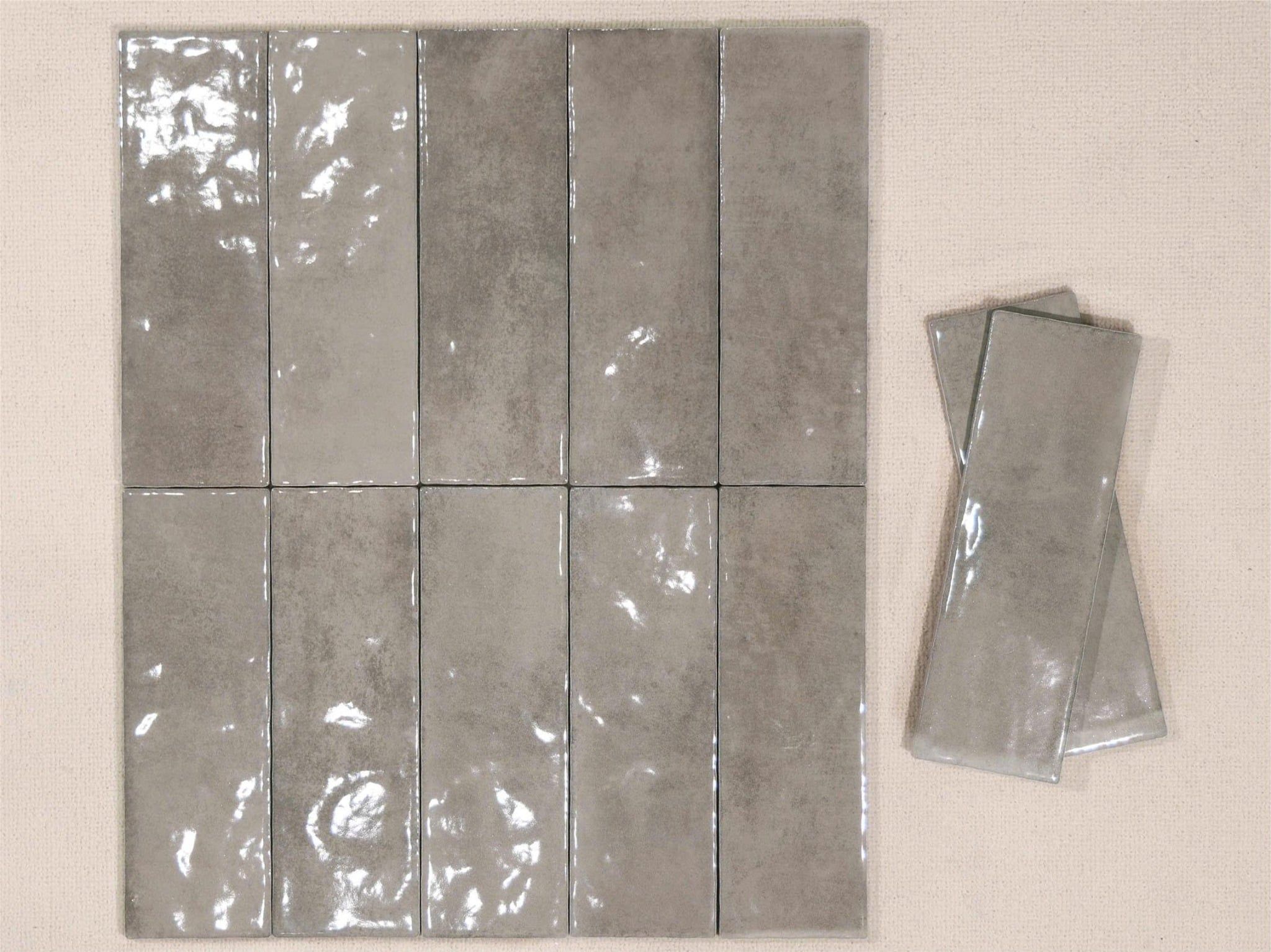 Gạch thẻ xương đá xám bóng lượn Art752303G