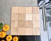 Gạch thẻ màu nâu vàng men mờ gợn sóng 100x100mm Art03M