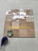 Gạch thẻ màu nâu vàng men bóng gợn sóng 100x100mm Art03G