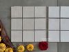 Gạch thẻ màu kem beige men mờ gợn sóng 100x100mm Art01M