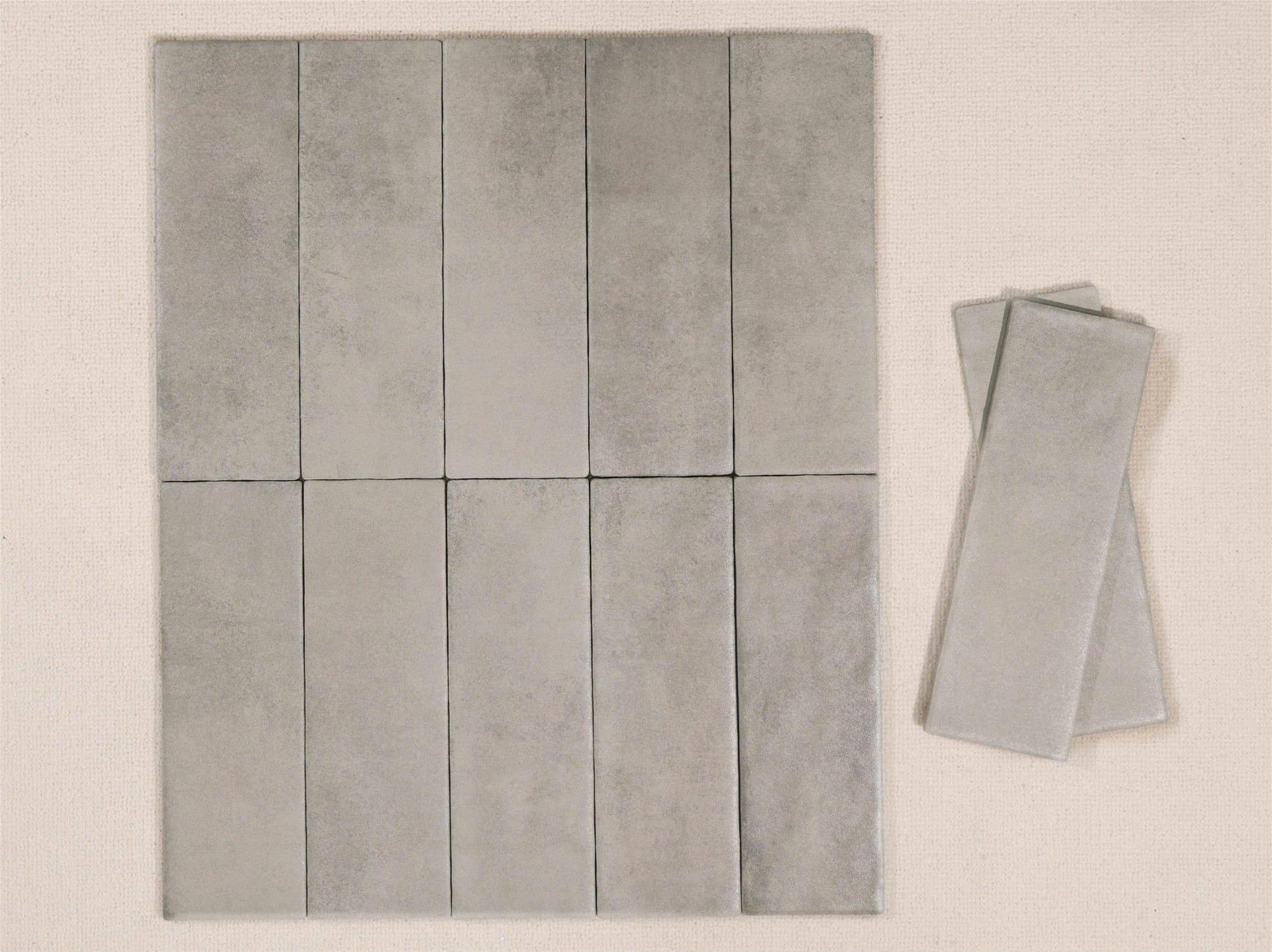 Gạch thẻ xương đá xám mờ lượn Art752303M