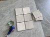 Gạch thẻ màu xám kem men bóng gợn sóng 100x100mm Art02G
