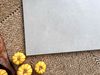 Gạch vân đá màu xám nhạt 60x60cm Art556
