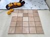 Gạch thẻ màu nâu vàng men mờ gợn sóng 100x100mm Art03M