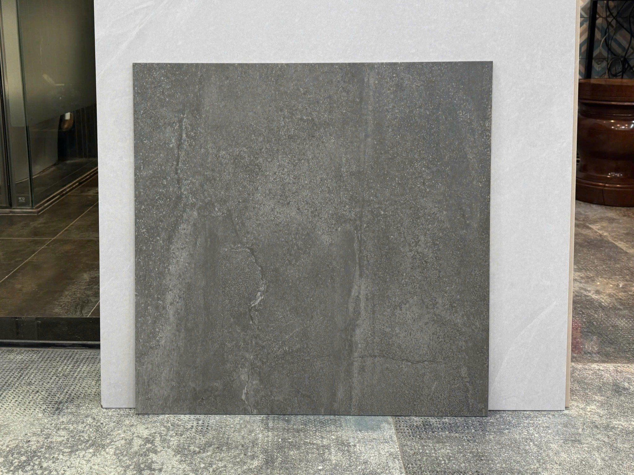 Gạch 60x60 xương đá đồng chất xám đậm