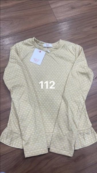  Áo TD lai bèo chấm bi vàng 