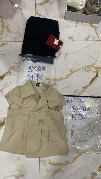  áo sm tay hến nịt eo đen M 