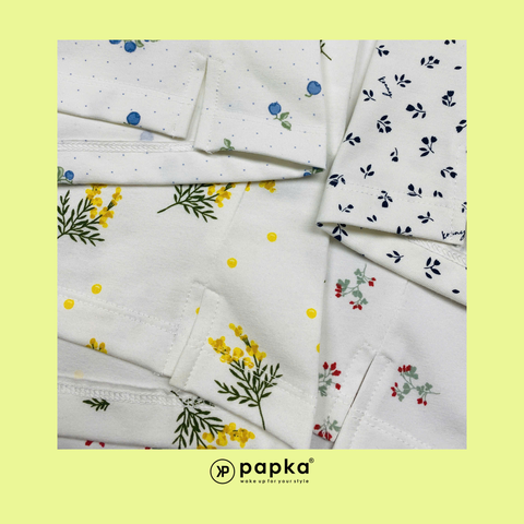 Áo thun nữ Papka 3031 màu trắng họa tiết hoa nhí màu xanh xẻ tà vạt ngắn trước sau mang vẻ trẻ trung thoải mái