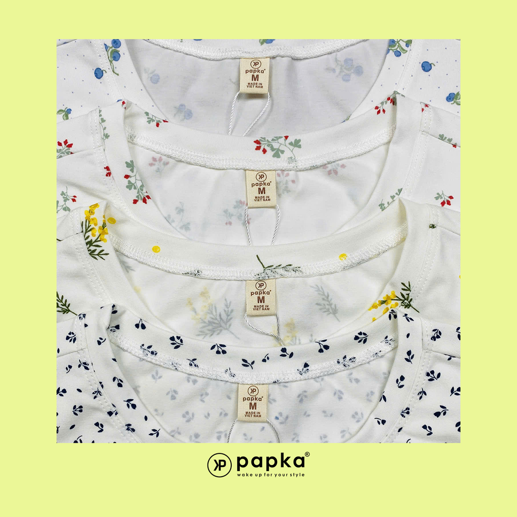 Áo thun nữ Papka 3031 màu trắng họa tiết hoa nhí màu xanh xẻ tà vạt ngắn trước sau mang vẻ trẻ trung thoải mái