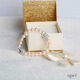  Vòng tay ngọc trai phối charm chữ vạn may mắn 