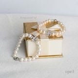  Vòng tay ngọc trai phối charm chữ vạn may mắn 