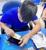 thay kính lưng iPhone bị vỡ