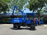 Máy trộn bê tông tự cấp liệu Hồng Hà gầu ghíp
