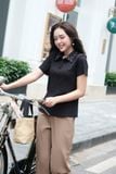  Áo thun polo đen đính đá cổ 