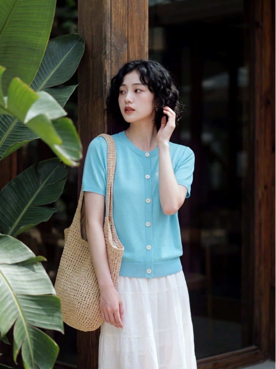  Áo thun dệt xanh ngọc lam thêu ngực 