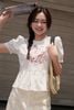 Áo peplum cổ nhún thêu linh lan hồng