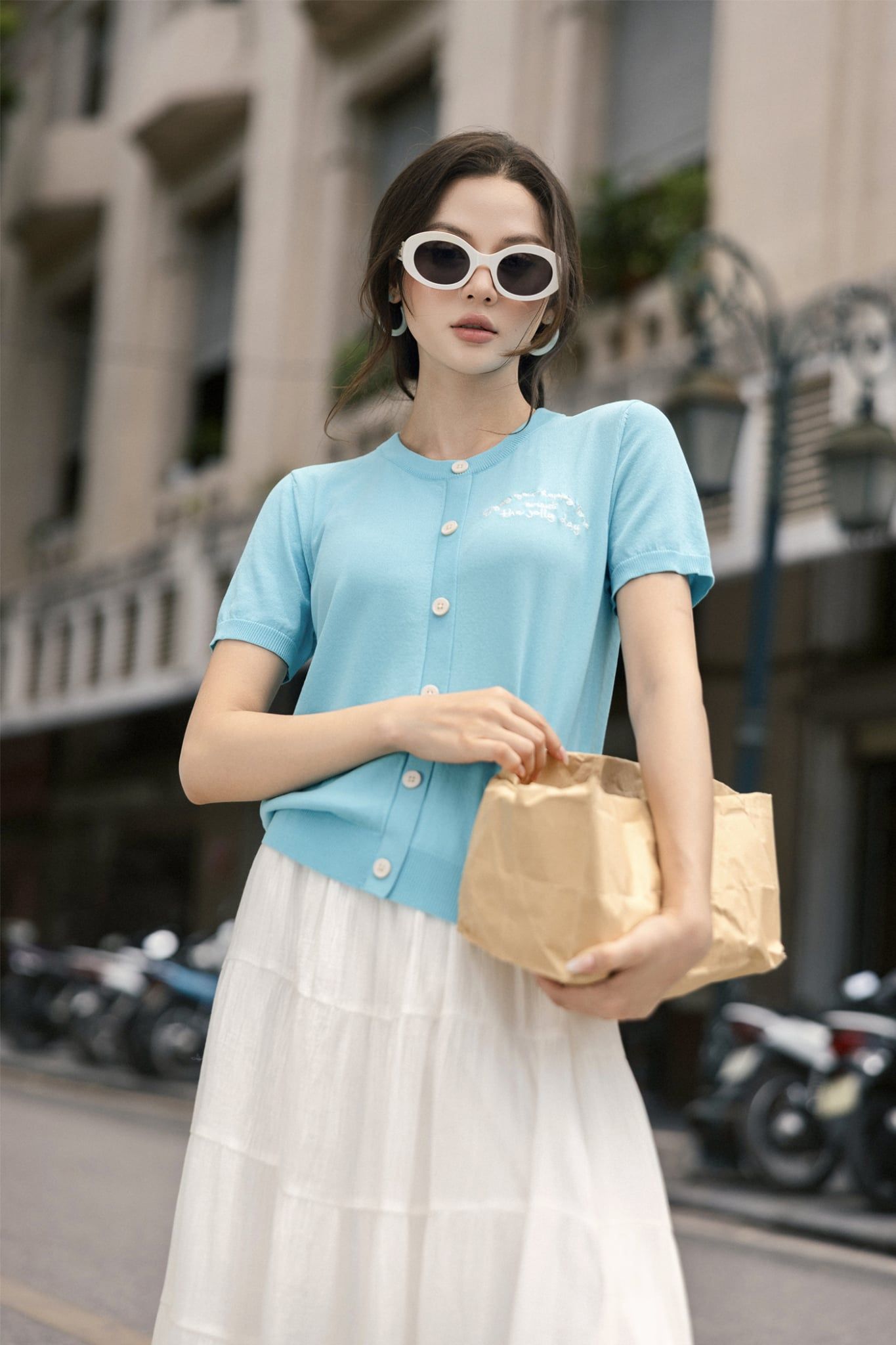  Áo thun dệt xanh ngọc lam thêu ngực 