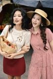  Đầm karo đỏ nối tầng đính charm 