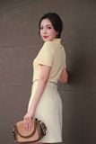  Áo thun polo vàng kem thêu lá cổ 
