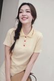  Áo thun polo vàng kem thêu lá cổ 