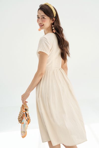 Đầm midi đũi mềm kem thêu hoa