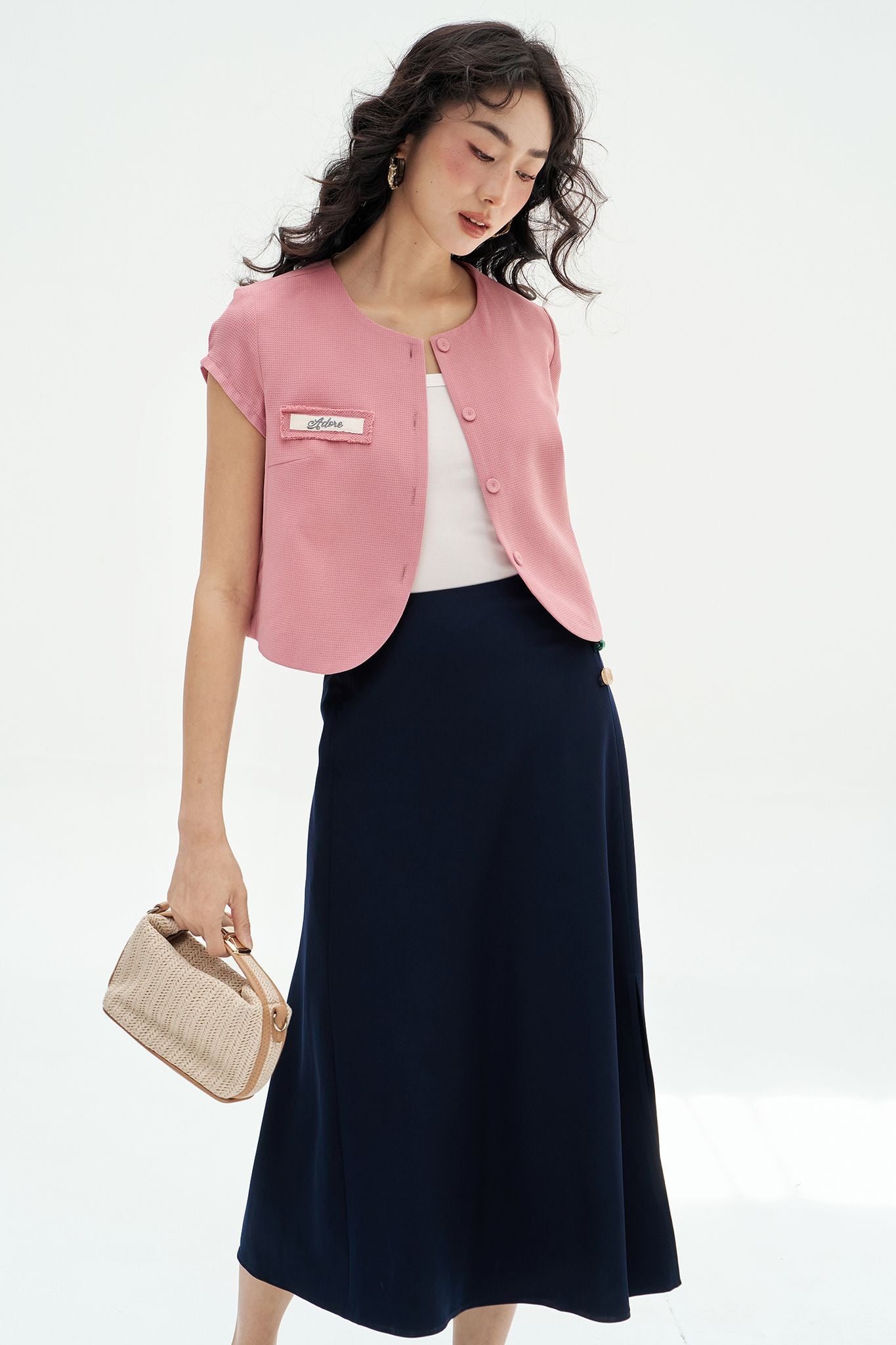 Áo poly xốp hồng túi cơi đáp thêu