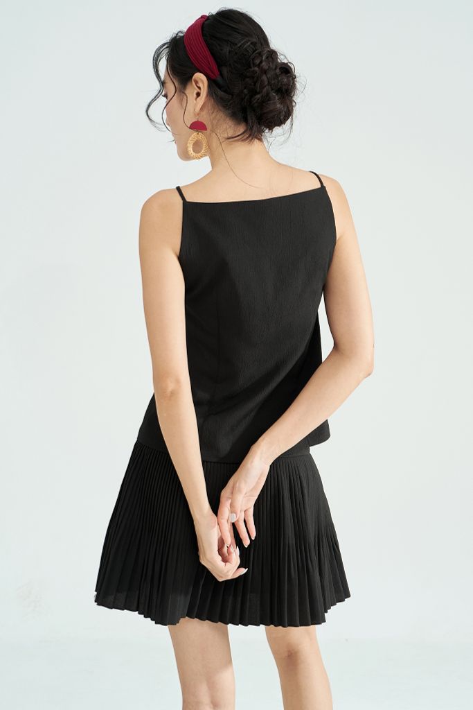 Chân váy mini xốp đen dập ly random