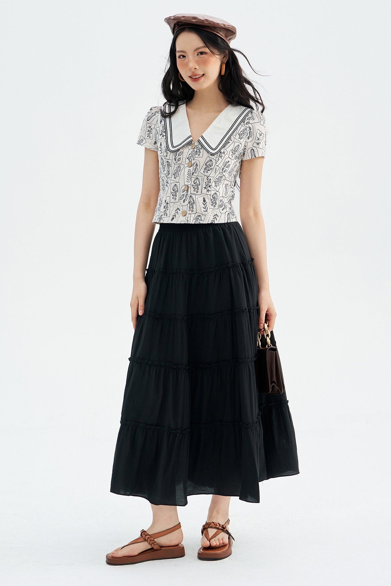 Top hoạ tiết stamp navy phối dây trang trí cổ