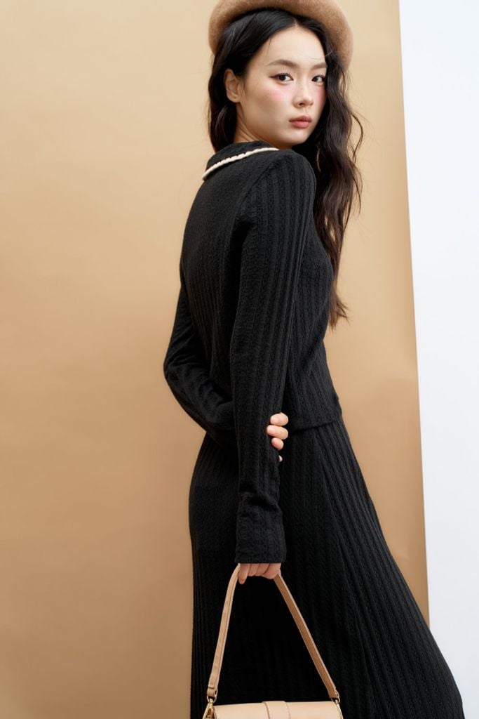 Chân váy midi len đen chạy diềm gấu